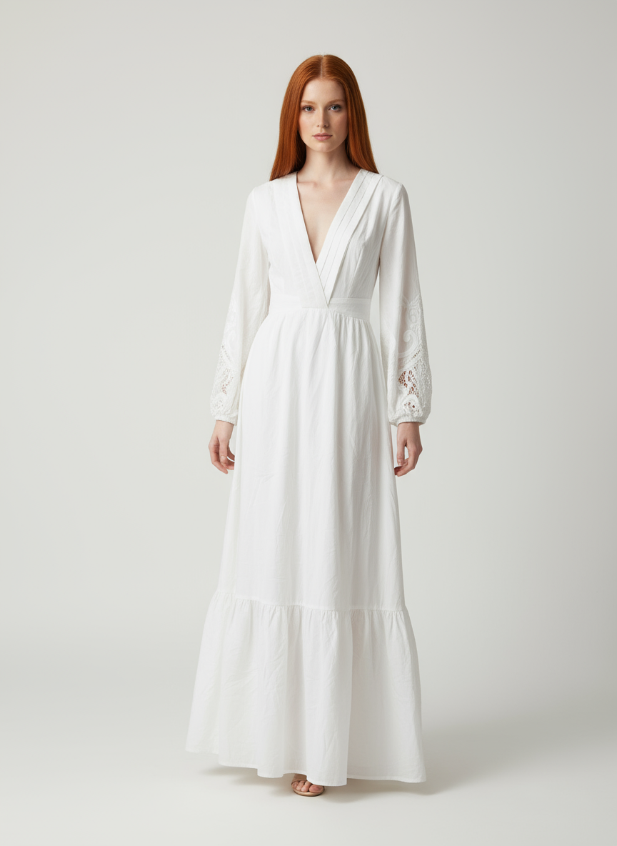 Modelo con vestido blanco largo y pelo rojo lacio