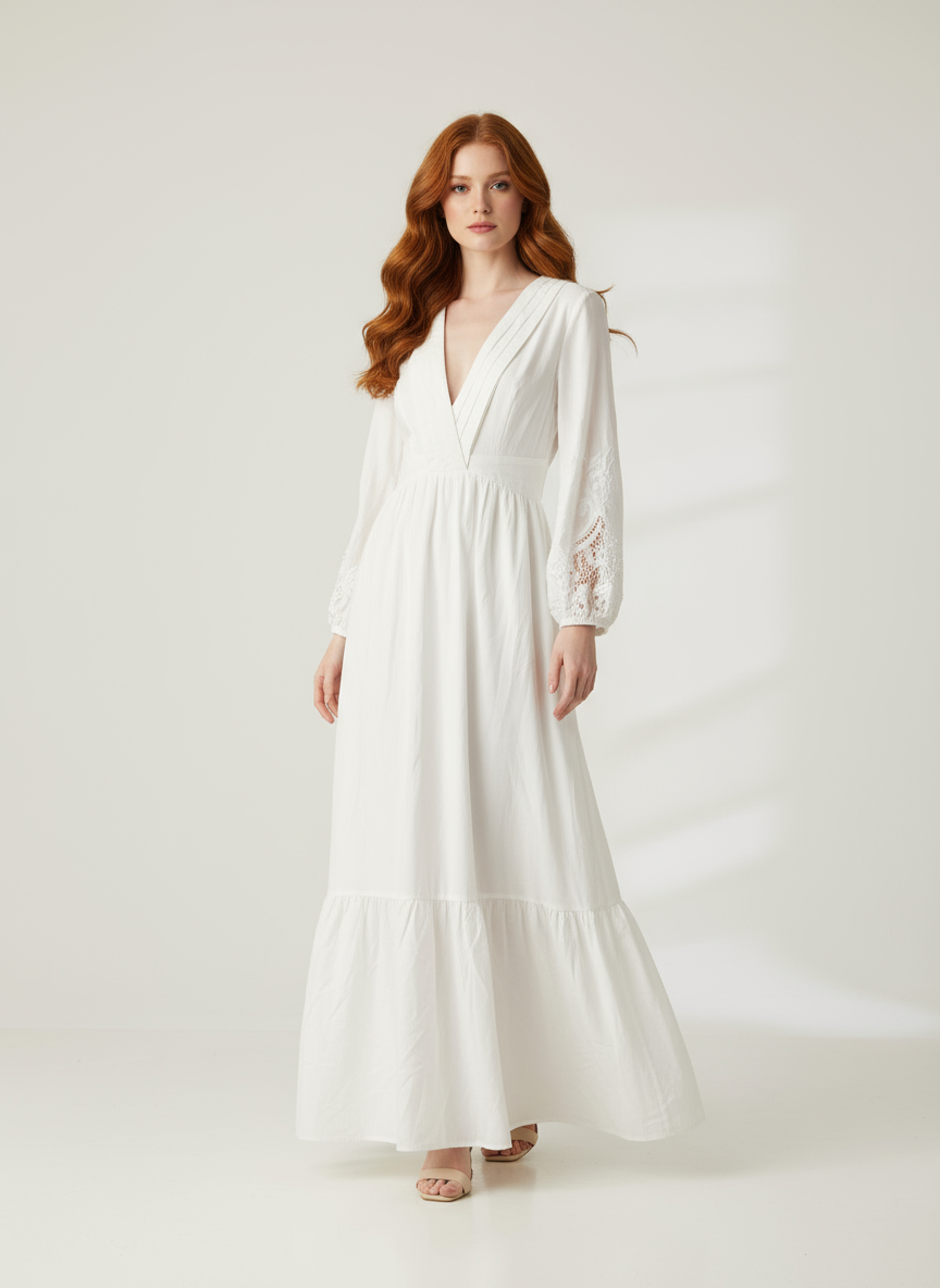 Modelo con vestido blanco y pelo rojo largo ondulado