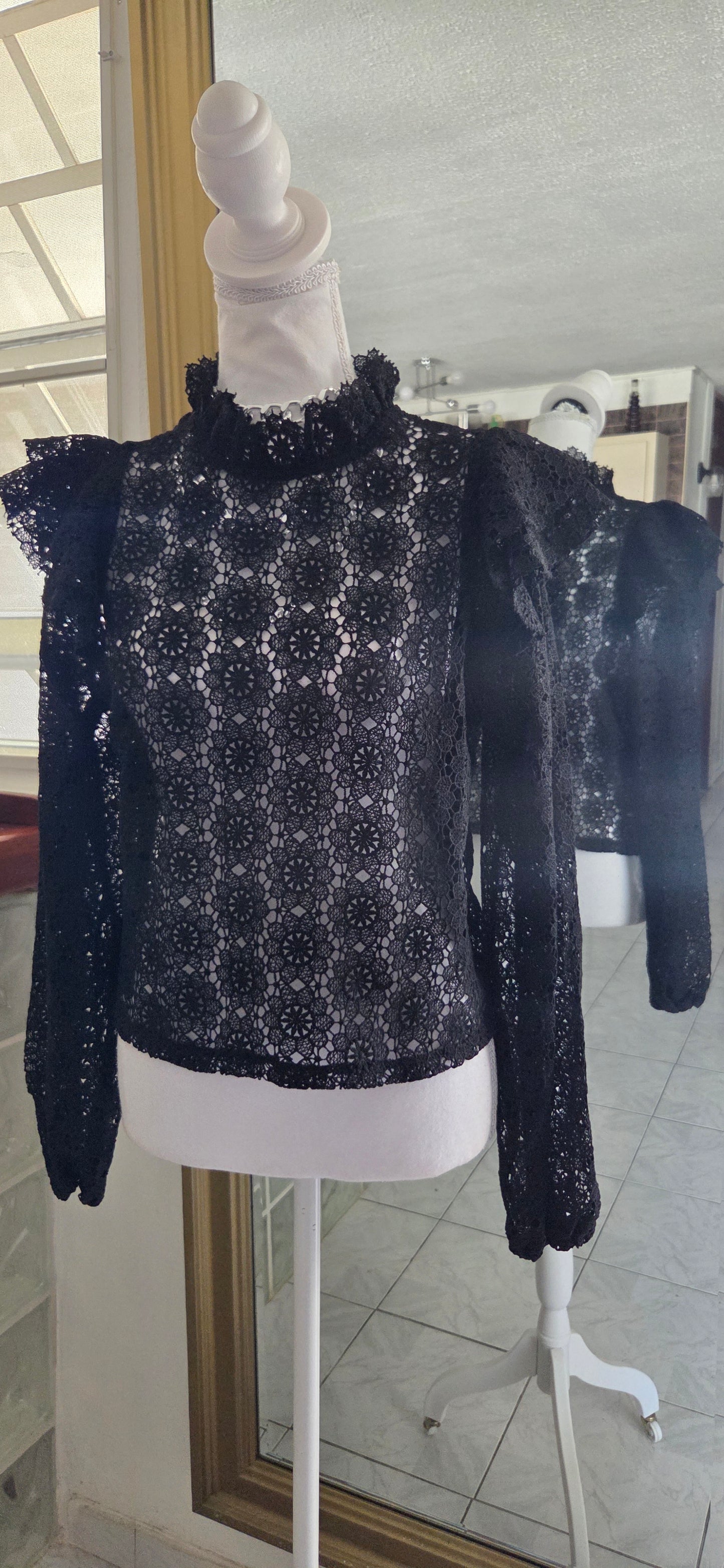 Blusa de encaje